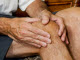 man with sore knee