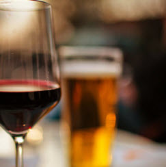 glass of wine and pint of beer