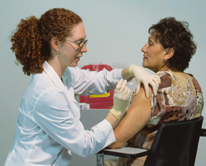 nurse giving a shot nurse giving a shot